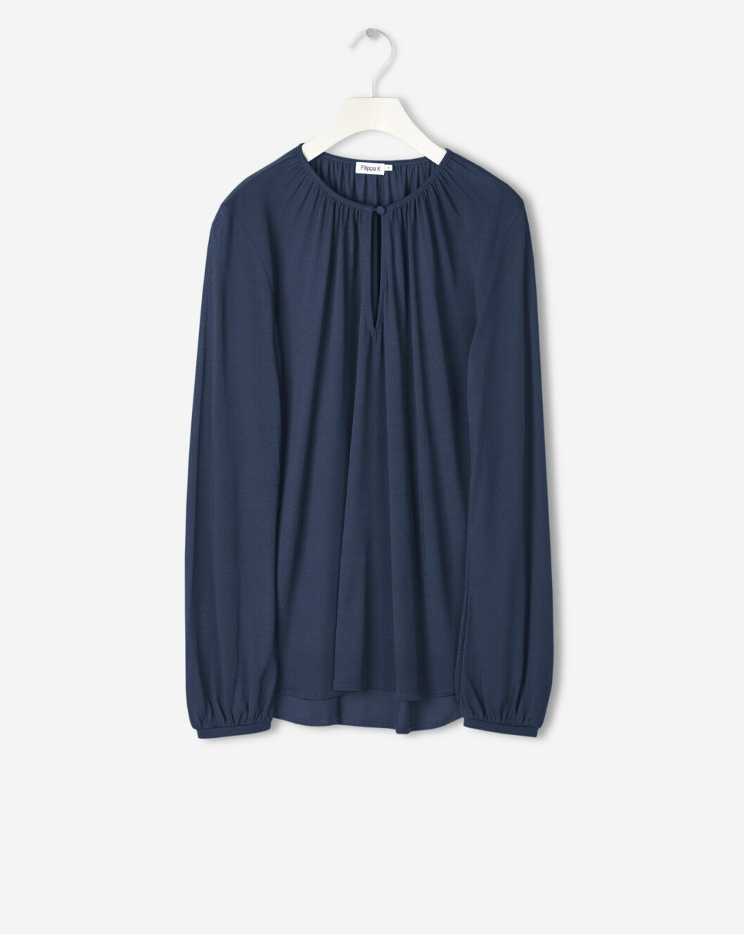 Blus med knapp