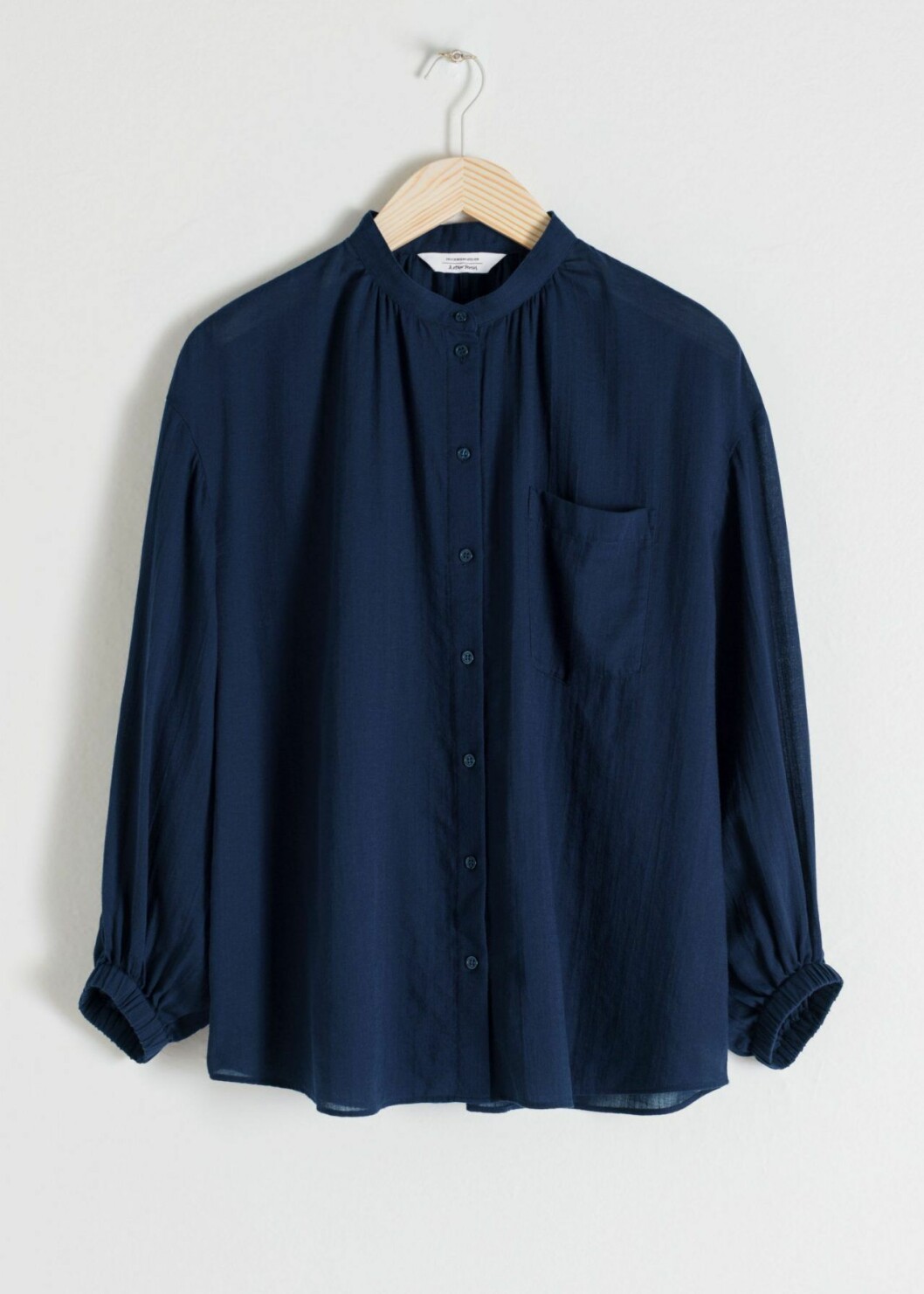 Blus ned ficka