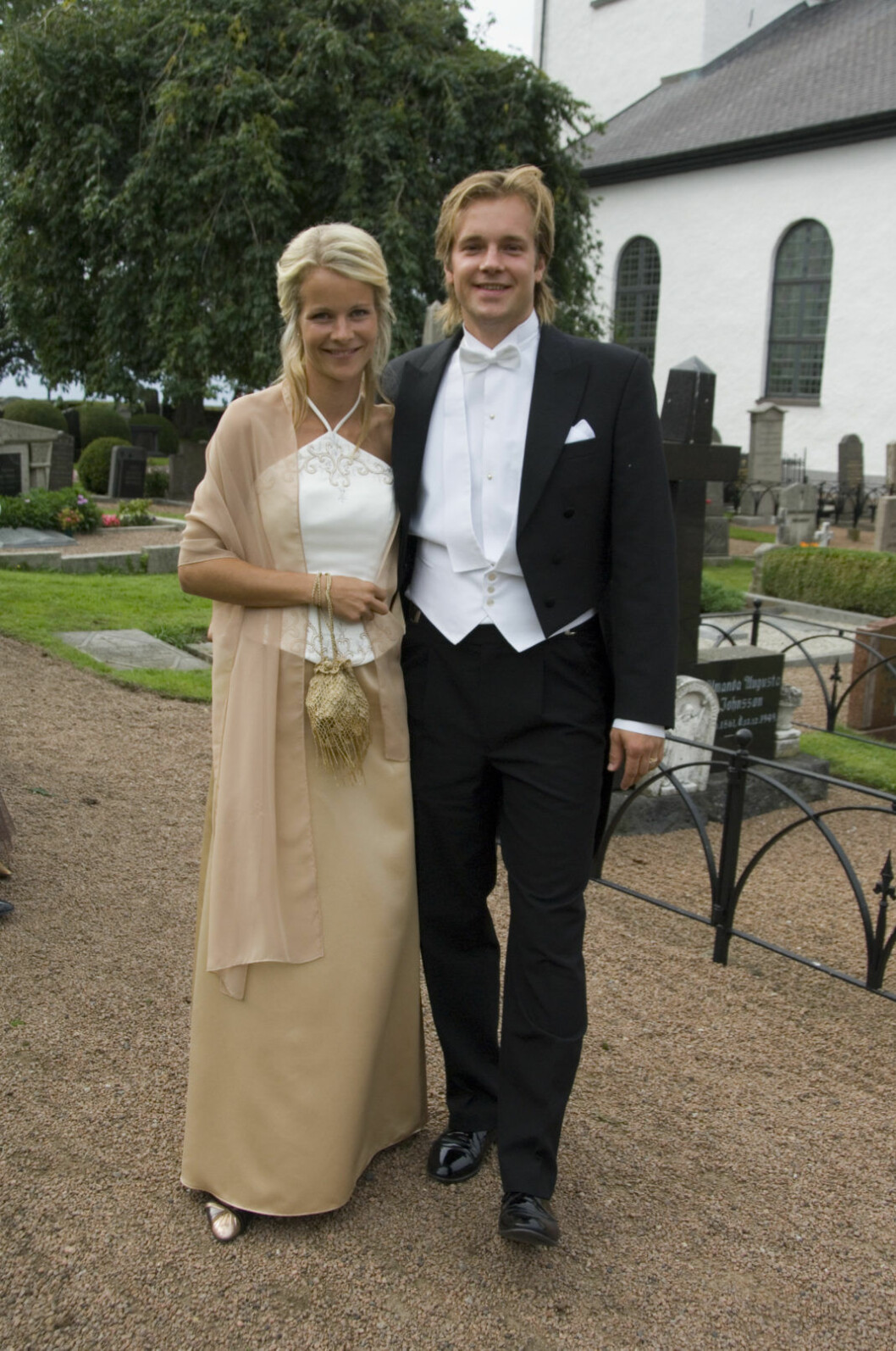 Brudens ryttarkompis Malin Baryard med maken Henrik Johnsson.