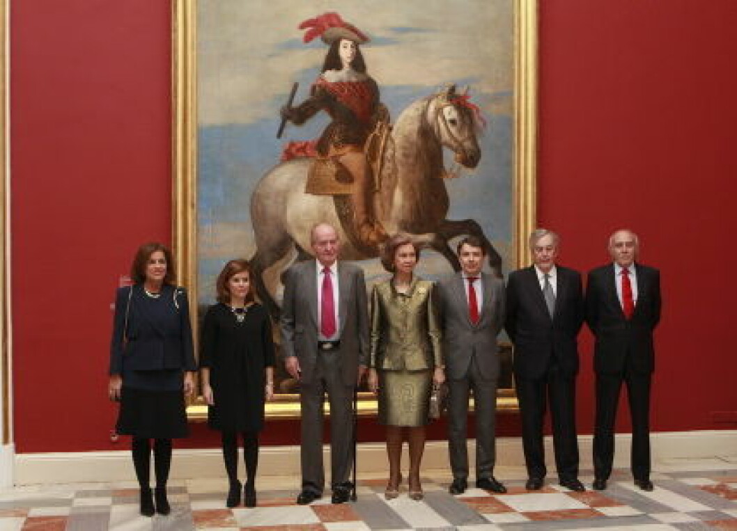 Spains King Juan Carlos and Queen Sofia attend the opening of the exhibition Portraits of the Royal Collections