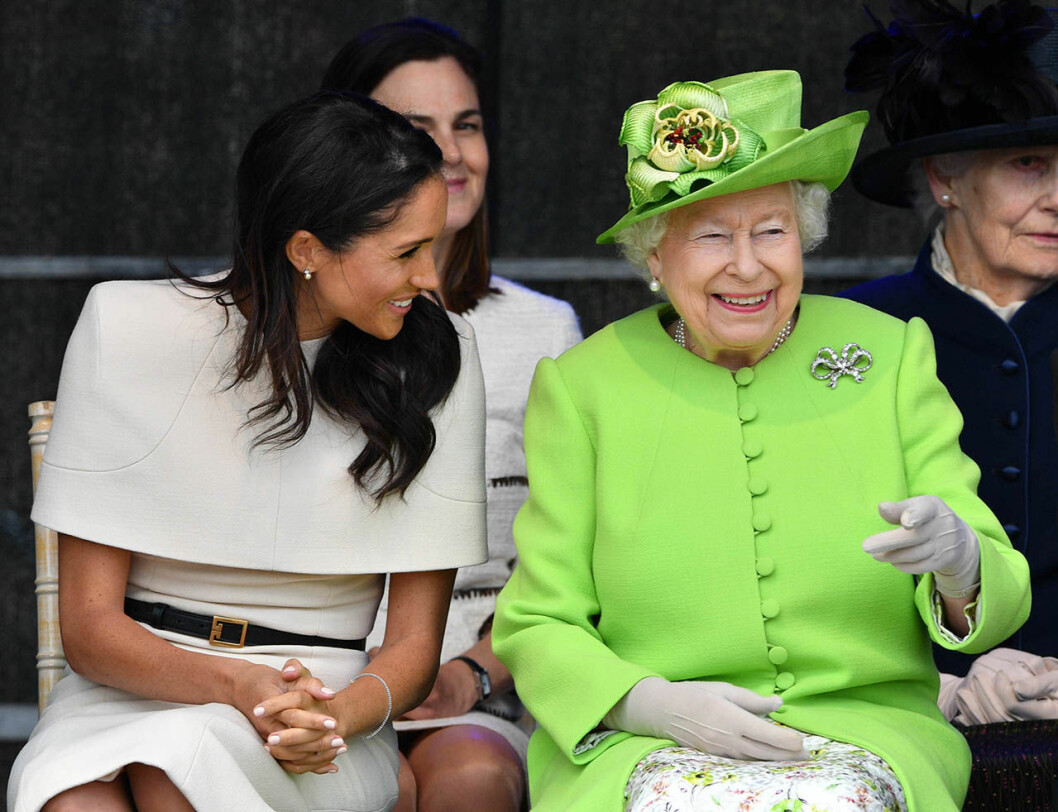 Drottning Elizabeth tillsammans med Meghan, sommaren 2018. Elizabeth Meghan