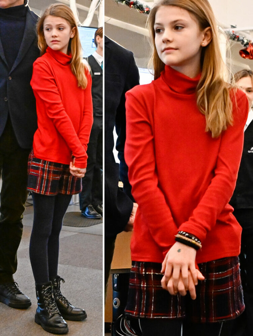 En liten fashionista i trendiga shorts. Prinsessan Estelle i rutiga shorts och röd tröja