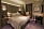 Ett hotellrum på Four seasons med en dubbelsäng