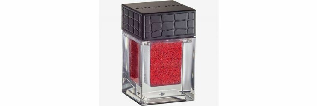 Rött ögonskuggsglitter