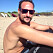 Kronprins Haakon på beachen med bar överkropp