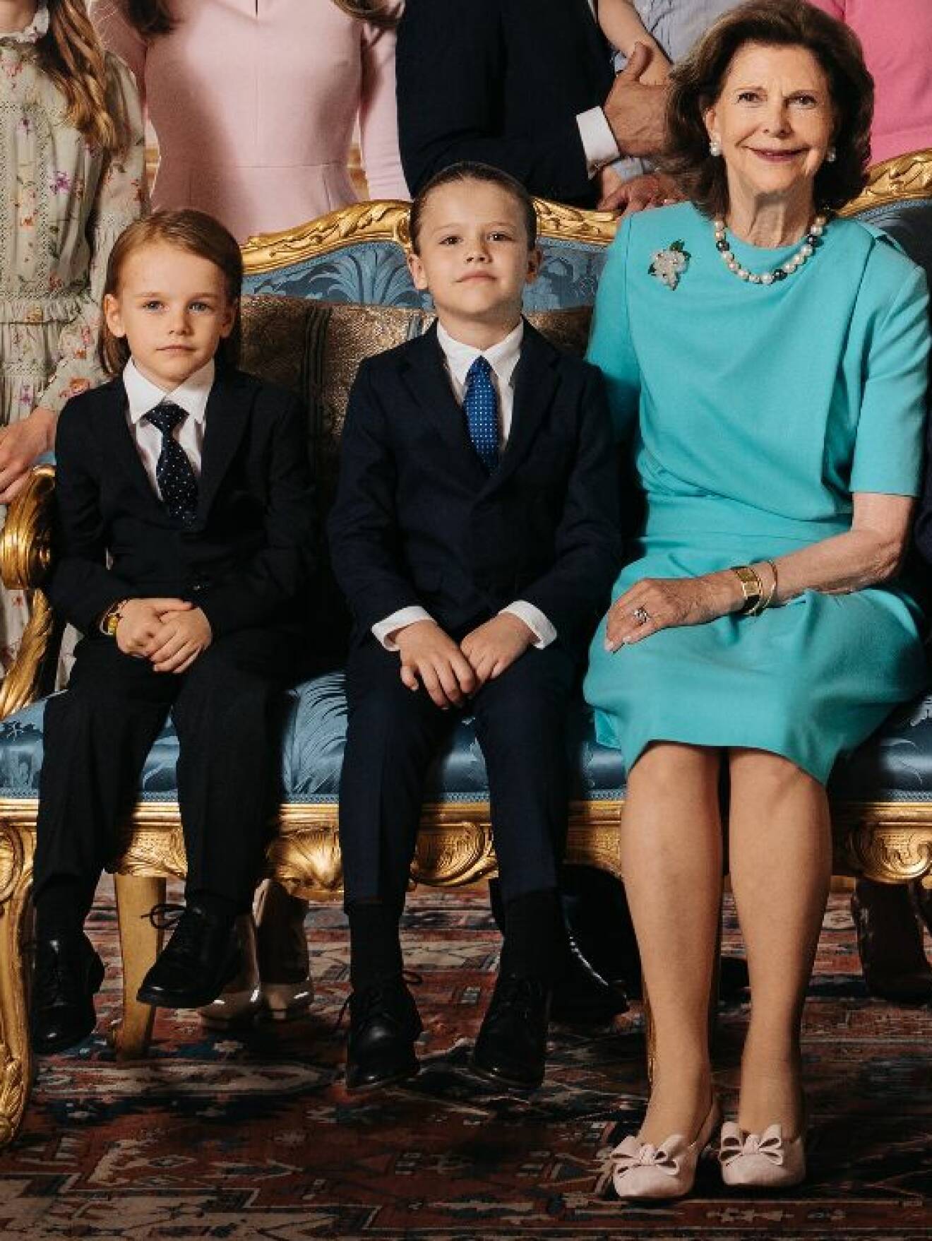 Drottning Silvia i skor från Sole Bliss, här med barnbarnen prins Gabriel och prins Alexander