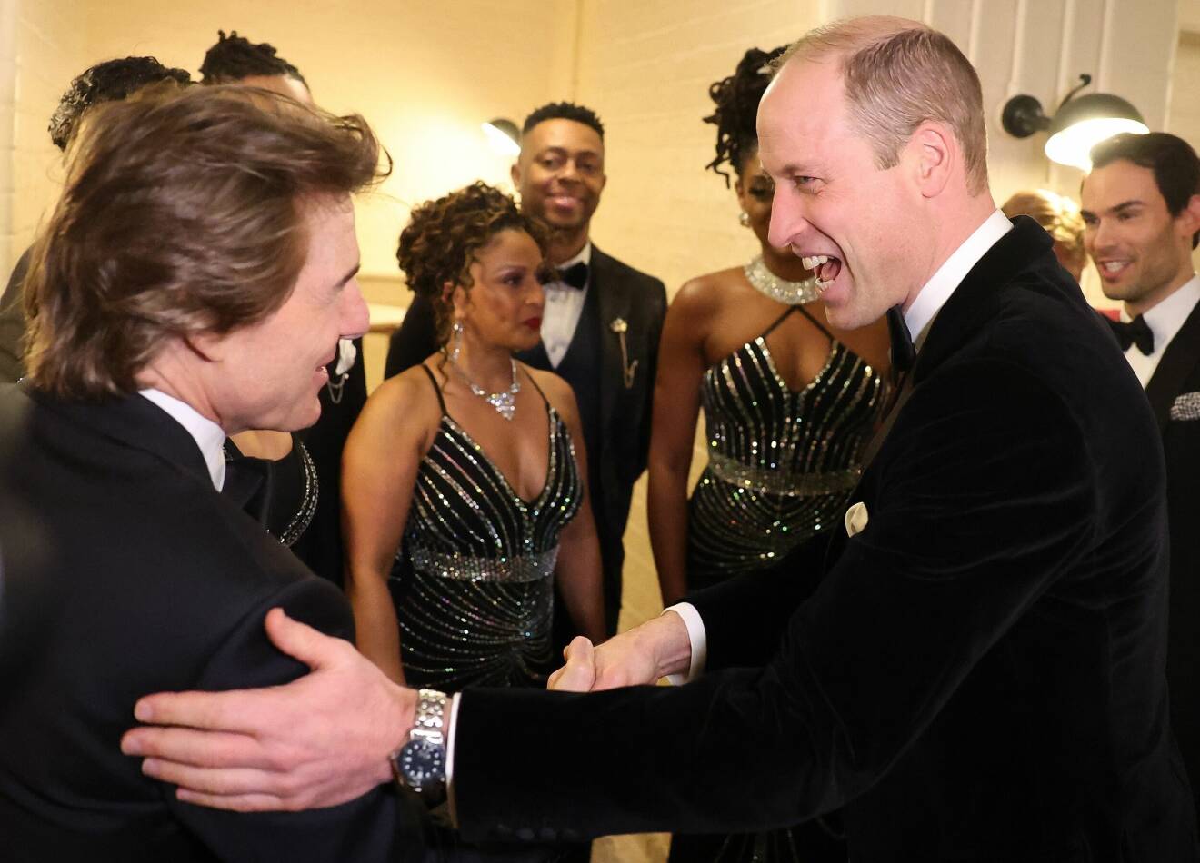 Tom Cruise och prins William skrattar
