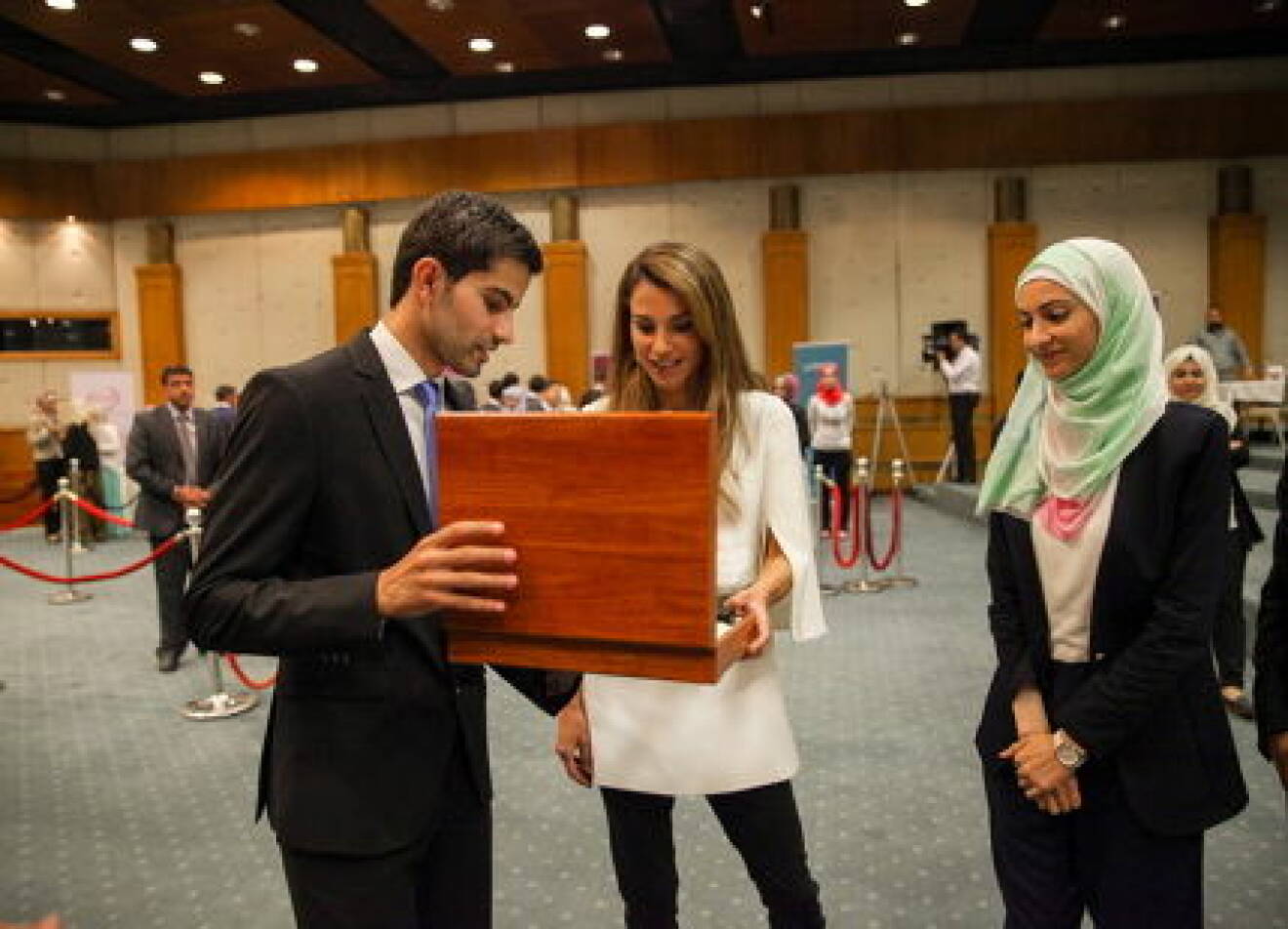 Queen Rania Al Abdullah checks on youth projects at the I Know Business (IKB) award competition day