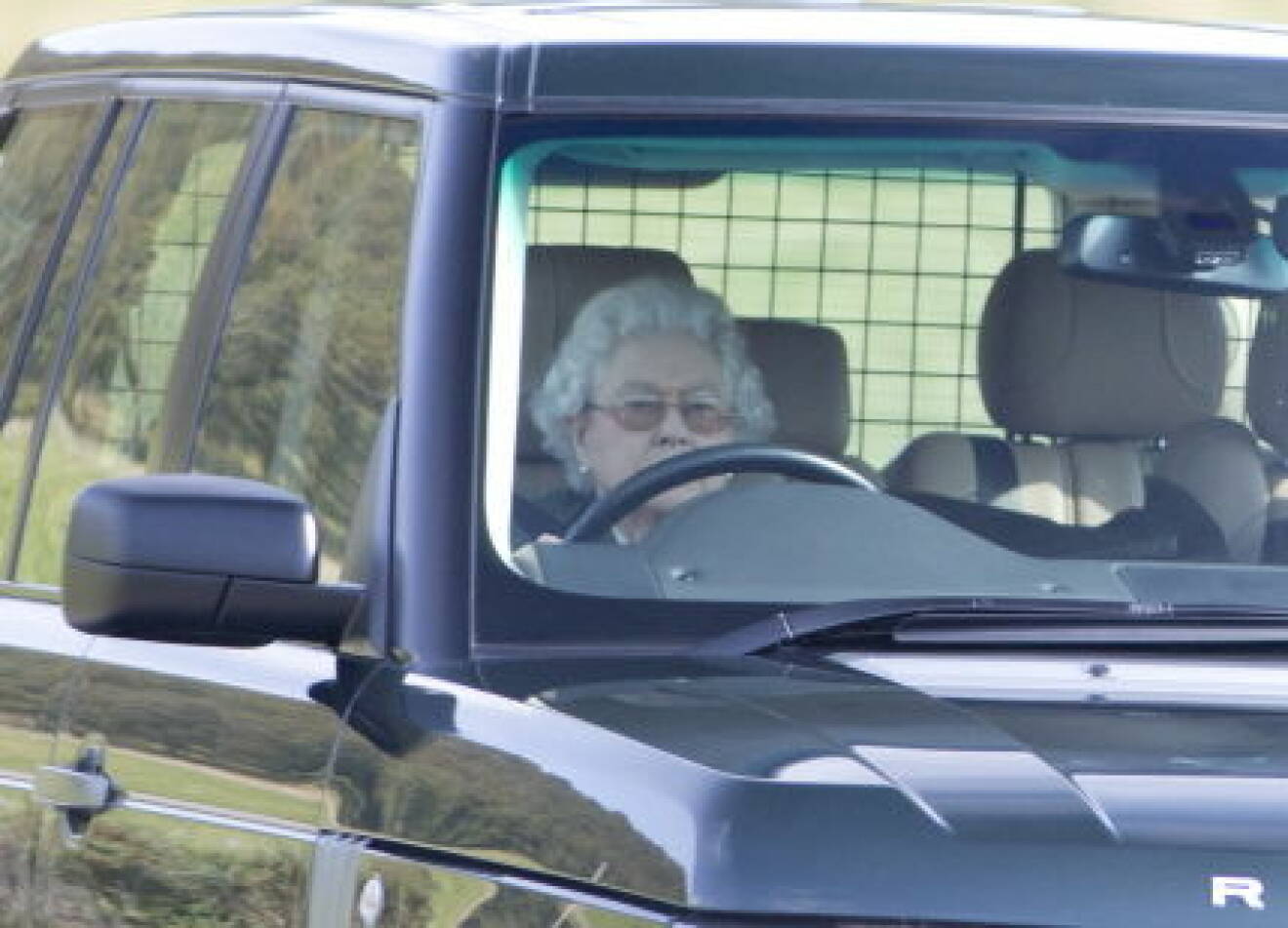 126180, EXCLUSIVE: Queen Elizabeth II at the wheel of her Range Rover as she leaves a grouse shoot near Balmoral, Scotland