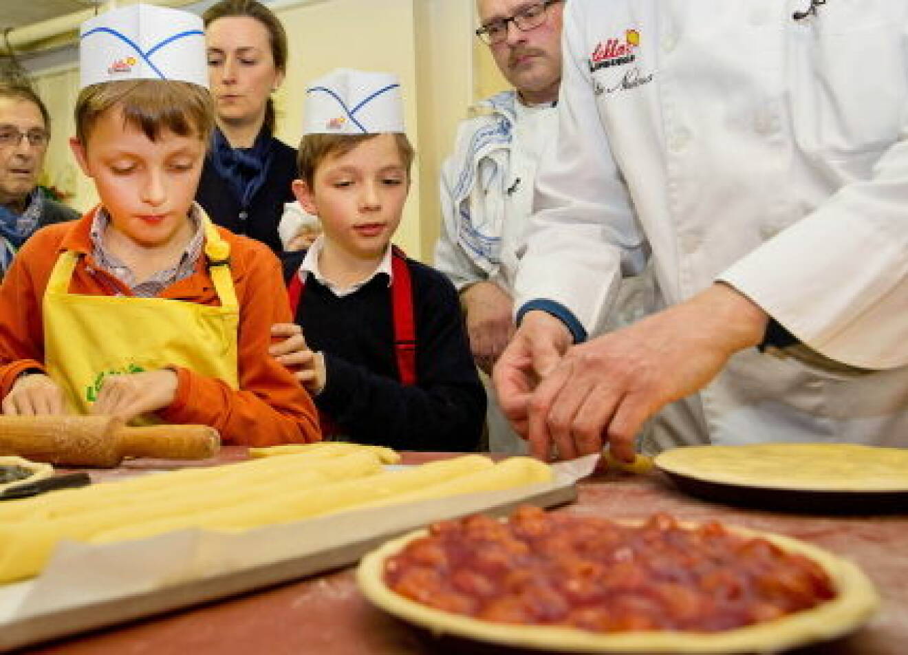 Belgium Prince Laurent, Princess Claire, Prince Nicolas and Prince Aymeric visits a bakery in belgium limburg for a a bake lesson of a Limburg pie and gingerbread of Hasselt