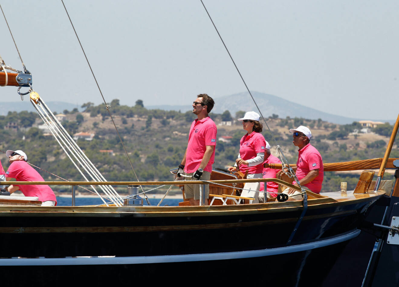 July 1, 2016 - Spetses Island, Greece - King CONSTANTINE of Greece with his son Prince NIKOLAOS of Greece participate with their traditional boat Afroessa, at Spetses Classic Yacht Regatta 2016. (Credit Image: © Aristidis Vafeiadakis via ZUMA Wire) (c) Zumapress / IBL