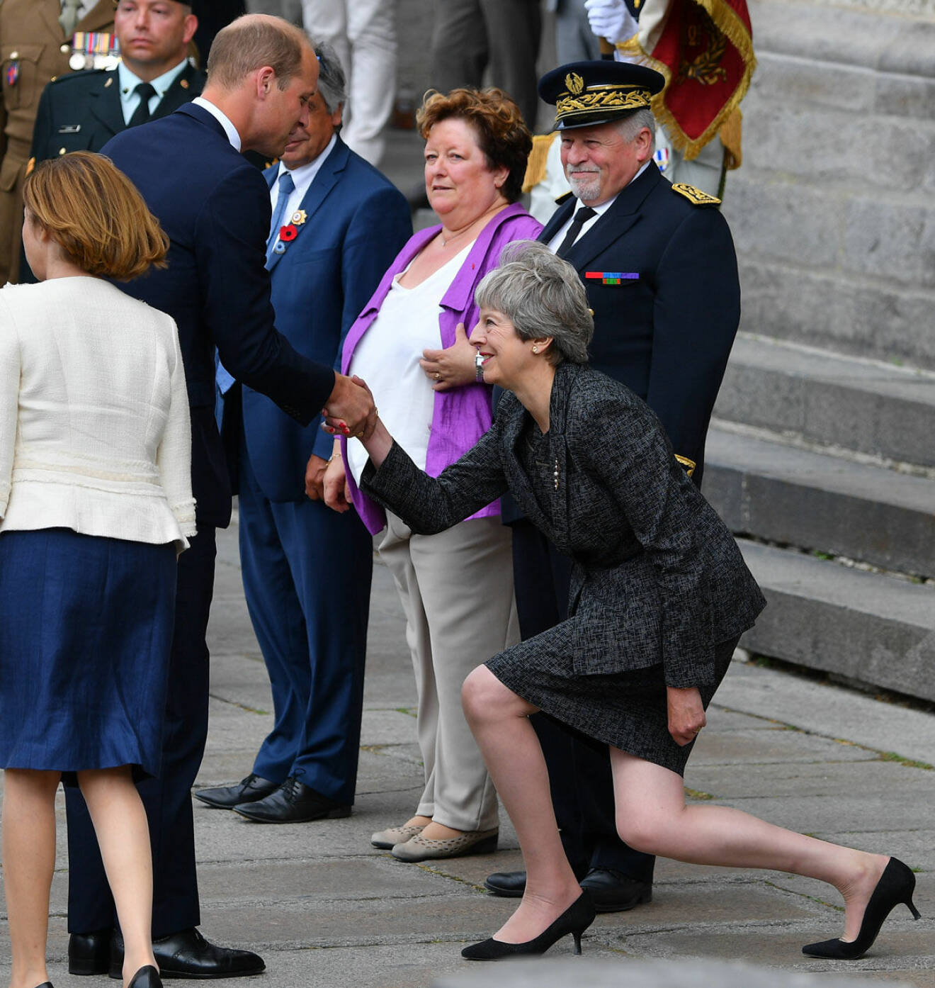 Prins William och Theresa May.