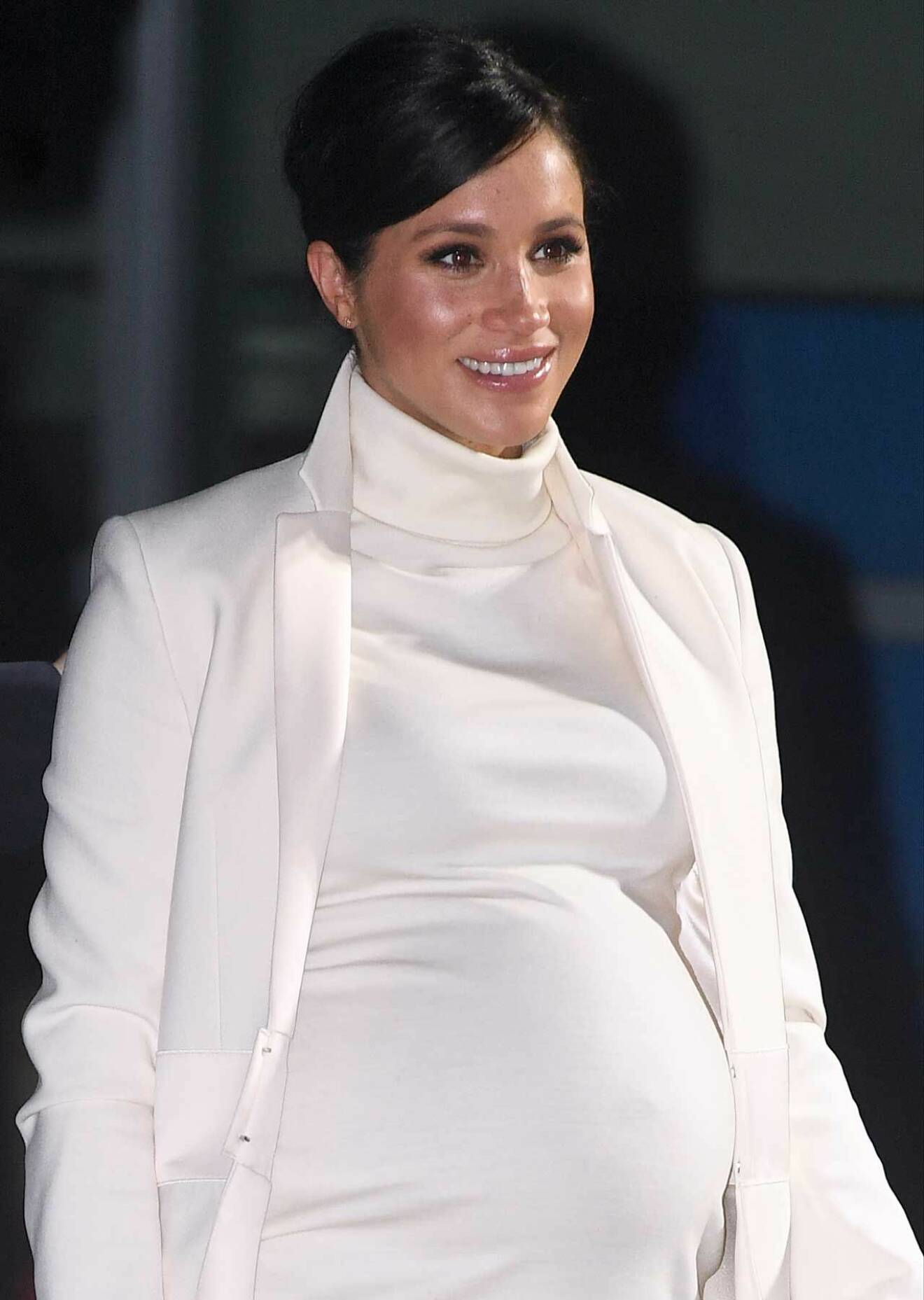 Hertiginnan Meghan är gravid i sjunde månaden.