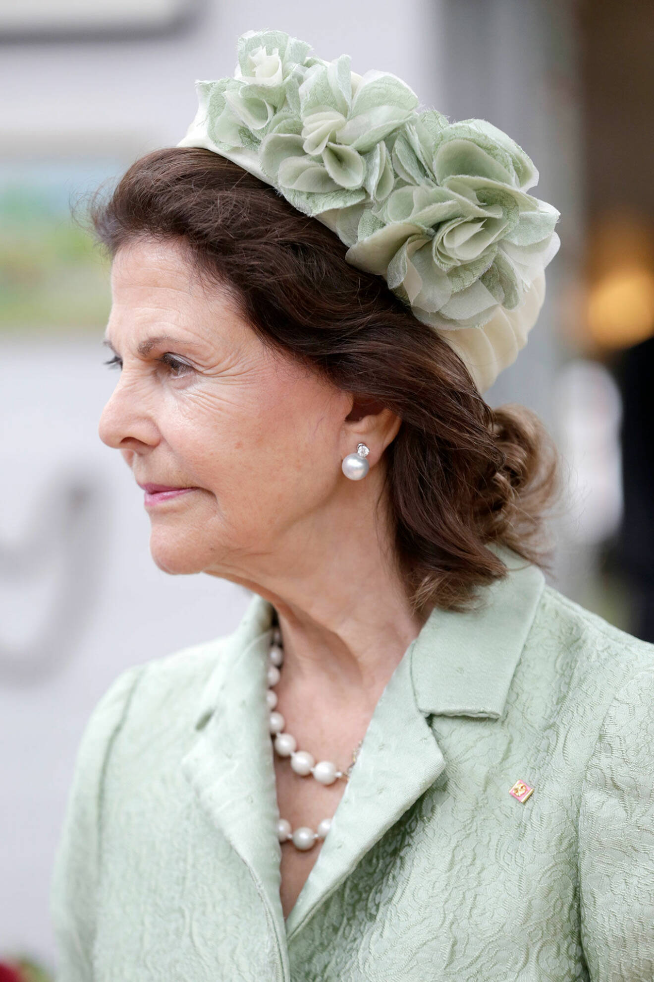 Statsbesök Sydkorea. Drottning Silvia i grön hatt.
