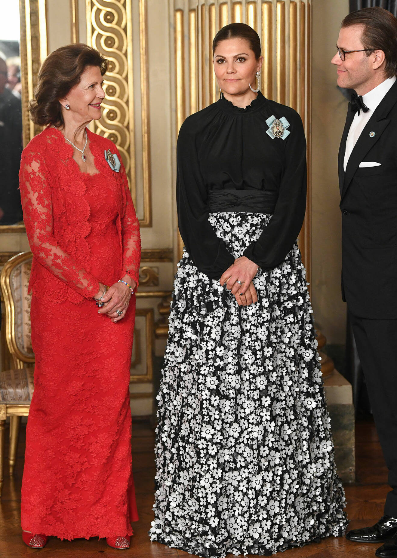 Drottning Silvia, kronprinsessan Victoria och prins Daniel vid Riksdagssupén 2019.