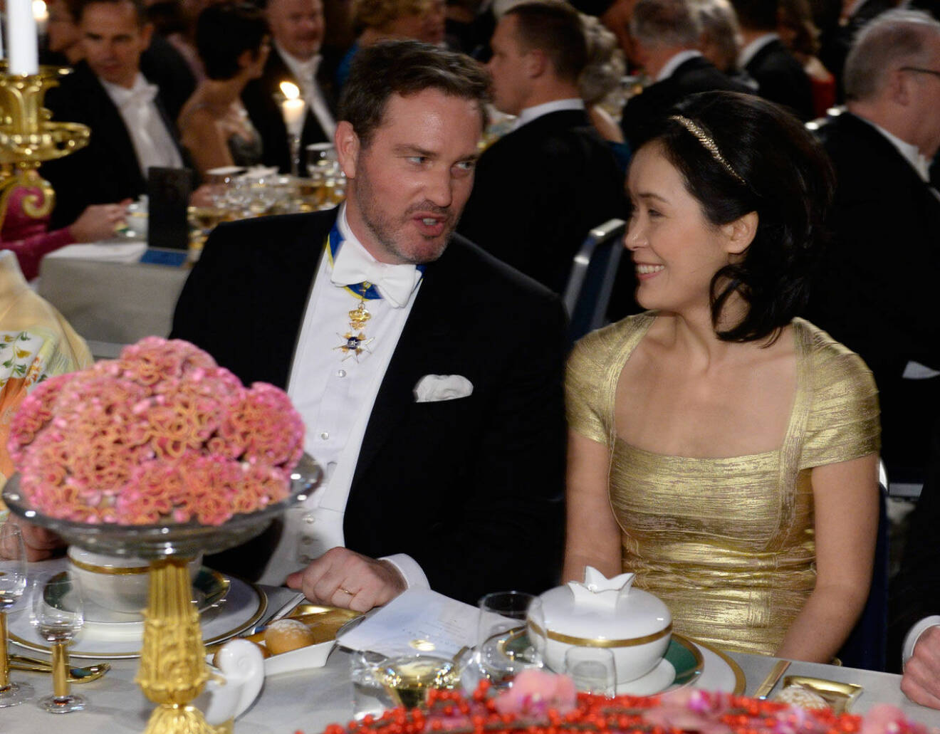 Chris O'Neill på Nobelfesten med sin bordsdam med doktor Ji Na.