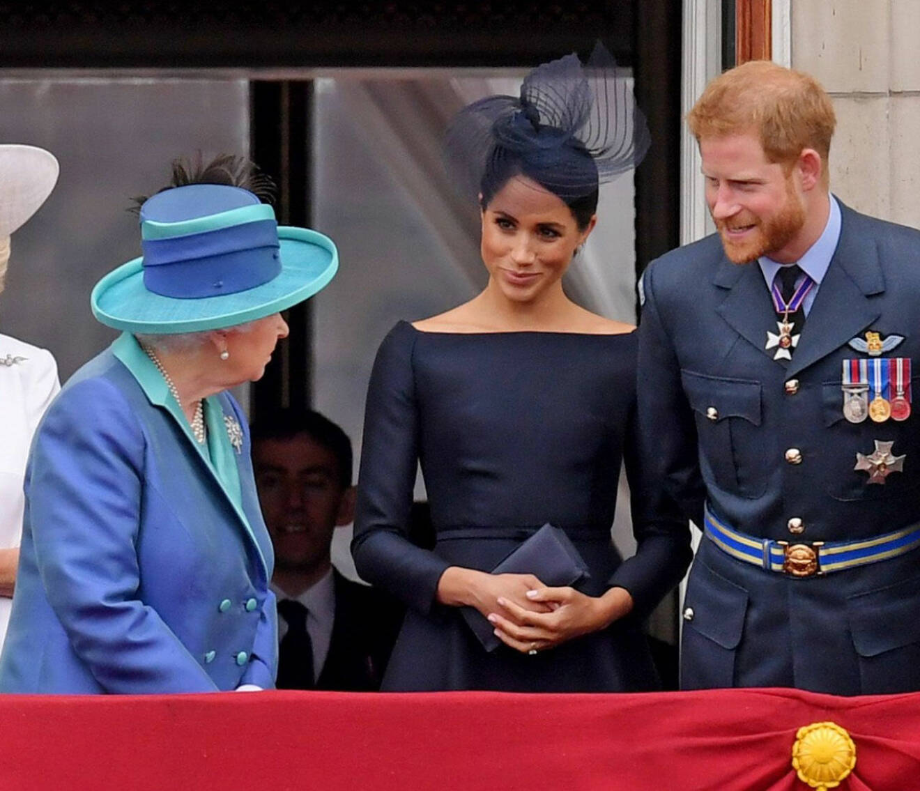 Drottning Elizabeth med Meghan och prins Harry.