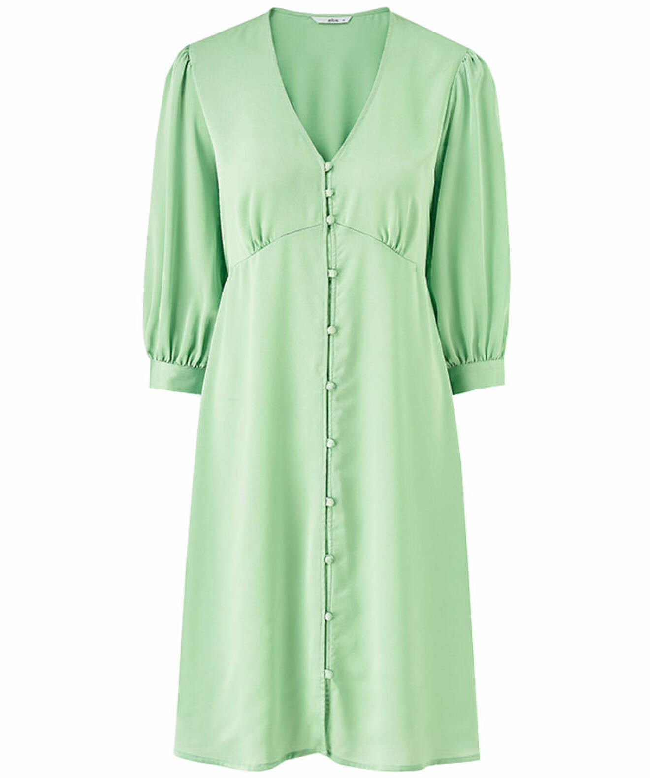 Grön V-ringad klänning med knappar