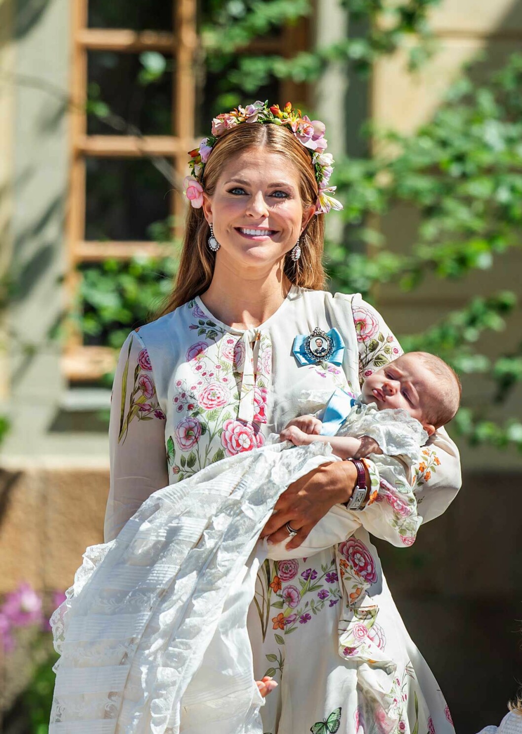 På Adriennes dop i klänning från Giambattista Valli. Prinsessan Madeleine