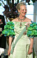 Drottning Margrethe fyller 80 år, här i en ljusgrön klänning med puffärmar.