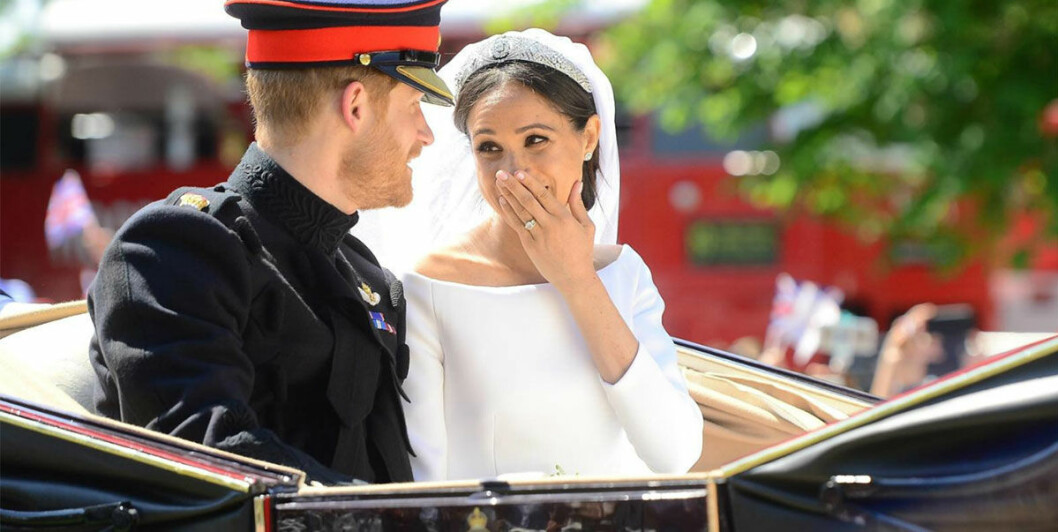 Prins Harry och Meghan Markle under bröllopskortegen. Prins Harry och Meghan Markle under bröllopskortegen