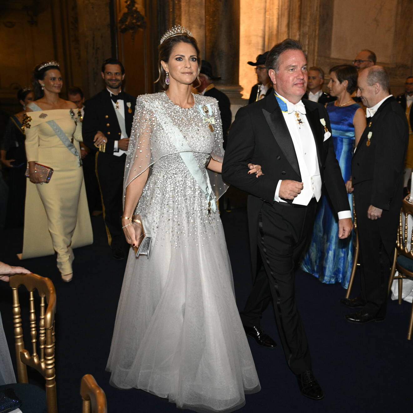 Prinsessan Madeleine och Chris O'Neill anländer till jubileumsbanketten i Rikssalen på Stockholms slott med anledning av kung Carl XVI Gustafs 50-årsjubileum på tronen.