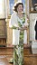 Drottning Silvia i en grön mönstrad aftonklänning