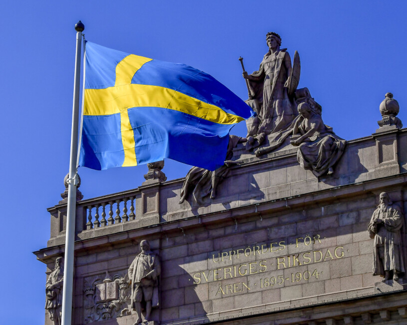 Flaggan utanför riksdagshuset i Stockholm. Flagga Riksdagshuset
