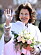 Drottning Silvia i vit cape under besöket i Karlskrona i Blekinge