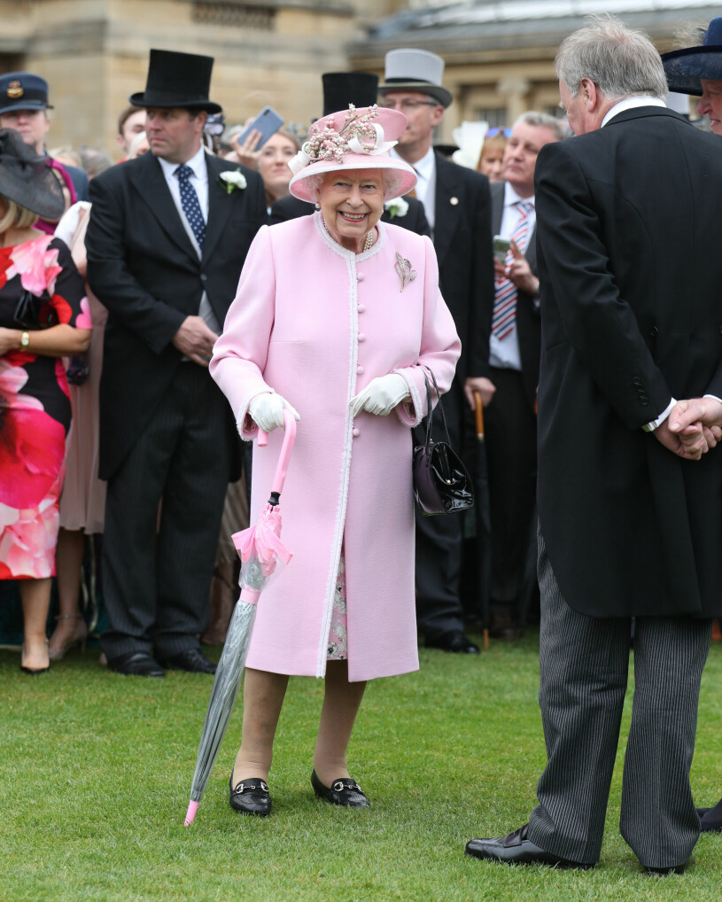 Drottning Elizabeth under tidigare festligheter vid Buckingham Palace. Drottning Elizabeth under tidigare festligheter