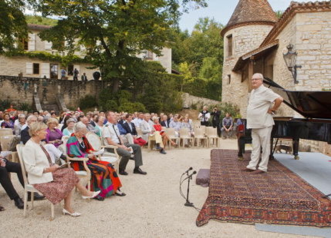 Queen Margrethe and Prince Henrik attending a concert taking place at Chateau de Cax