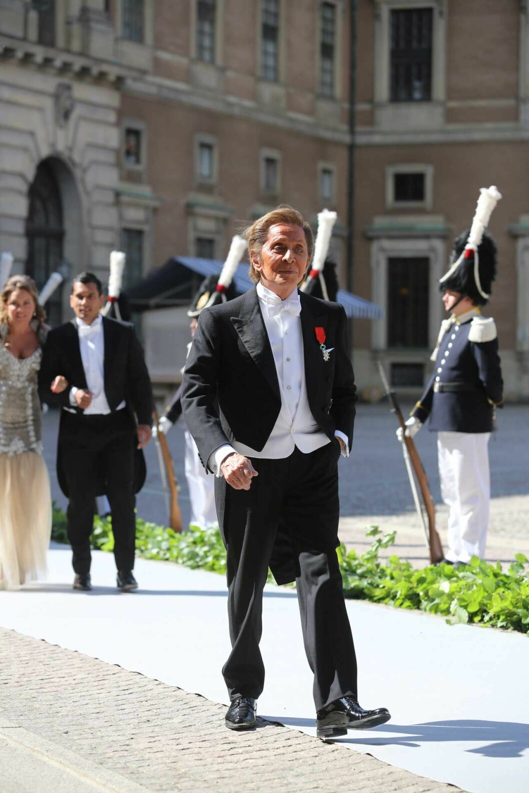 Valentino Garavani gjorde storstilad entré under Madeleines bröllop, år 2013. Valentino Garavani gjorde storstilad entré till bröllopet i juni 2013 i Stockholm.